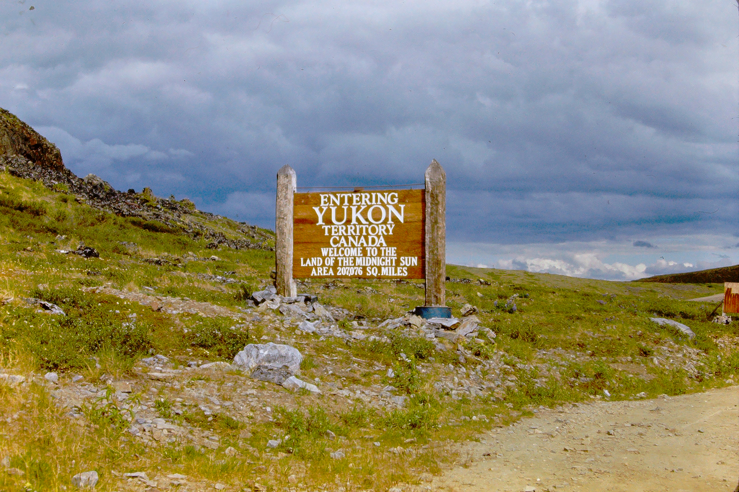 Entering the Yukon Territory after crossing from Alaska into Canada at at the Customs post known as Little Gold Creek, August 1966.