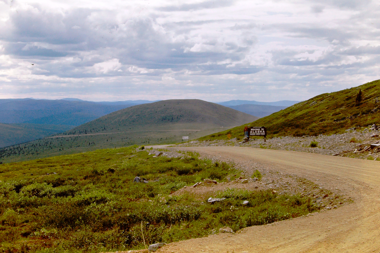 Looking back into Alaska from the US-Canada border on the Top of the World Highway, August 1966