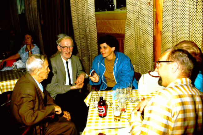 Gloria Larsen Malcolm Soine chat with local old-timers at the Occidental Hotel in Dawson City, July 1966
