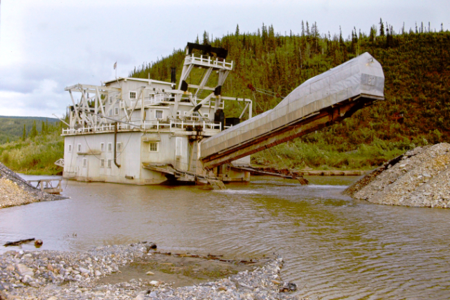 An operating gold dredge in the Klondike, 1966