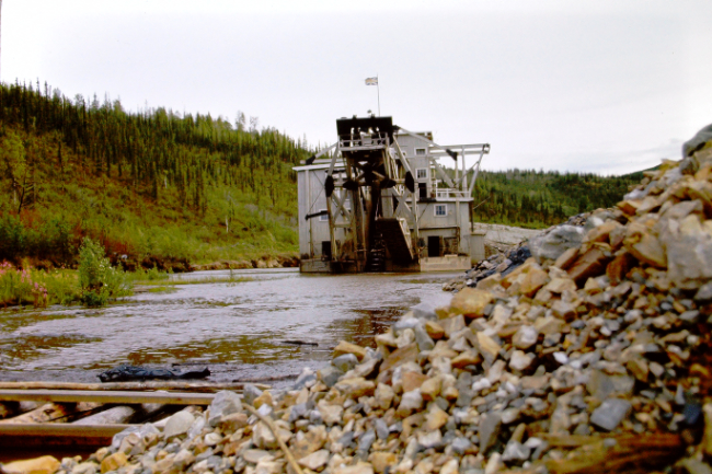 An operating gold dredge in the Klondike, 1966