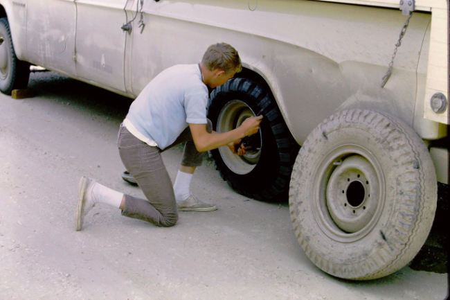 Repairing a truck tire at Skagway, July 1966