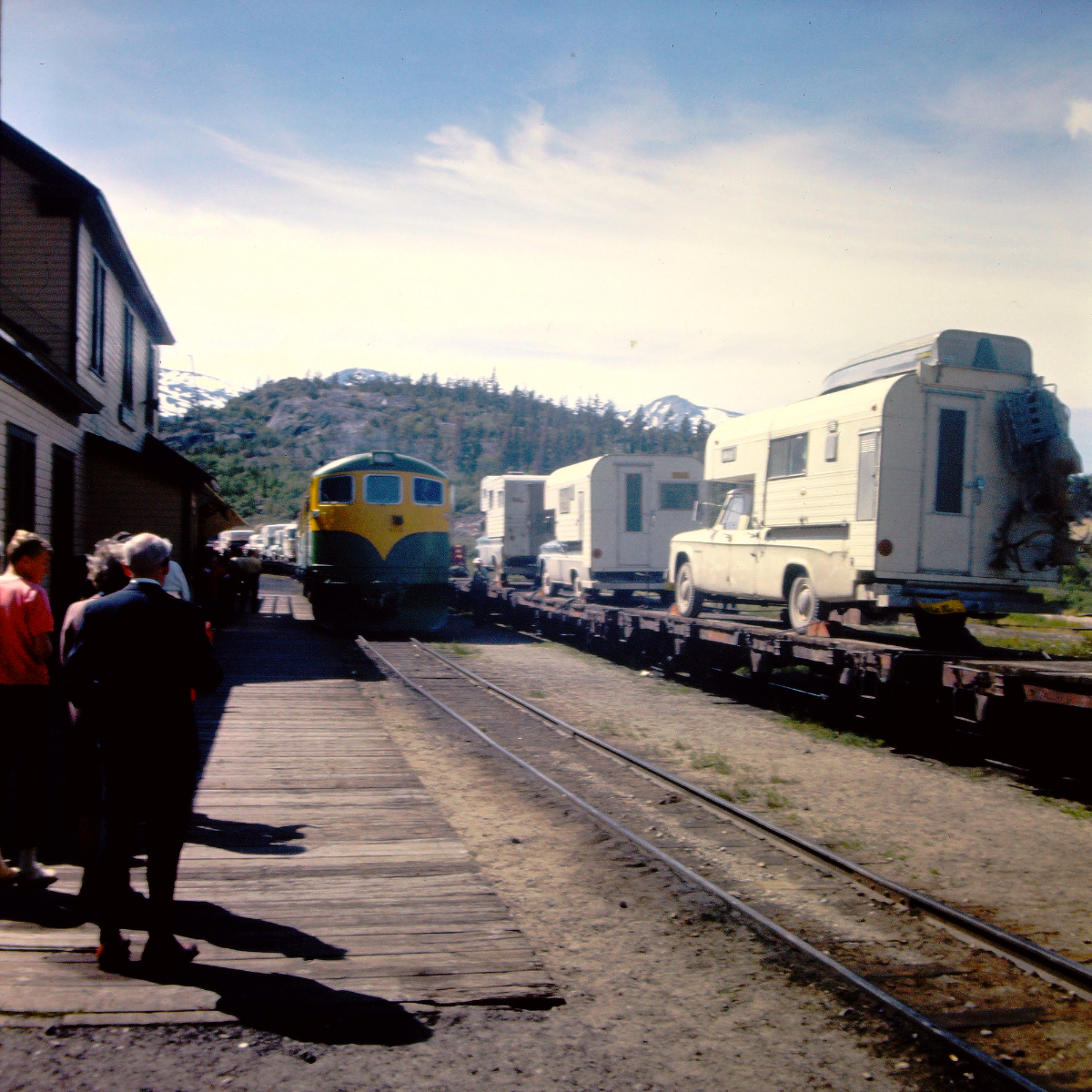 Northbound and southbound trains at the Bennett train station, 1966.