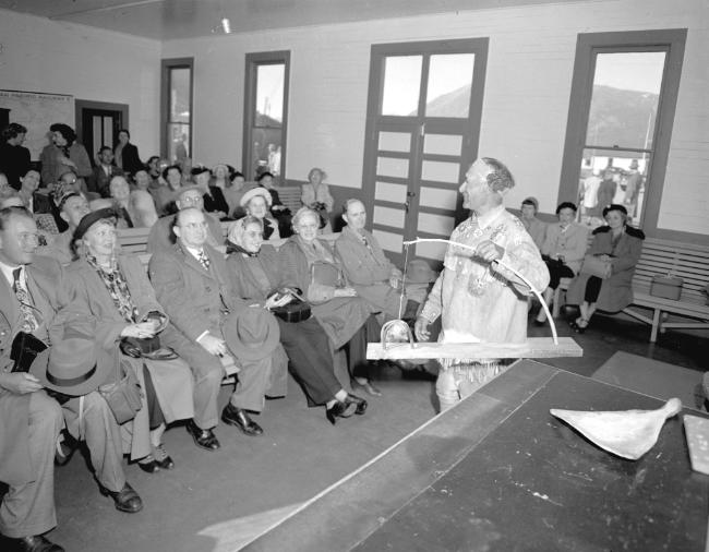 Patsy Henderson telling his stories at Carcross in 1949