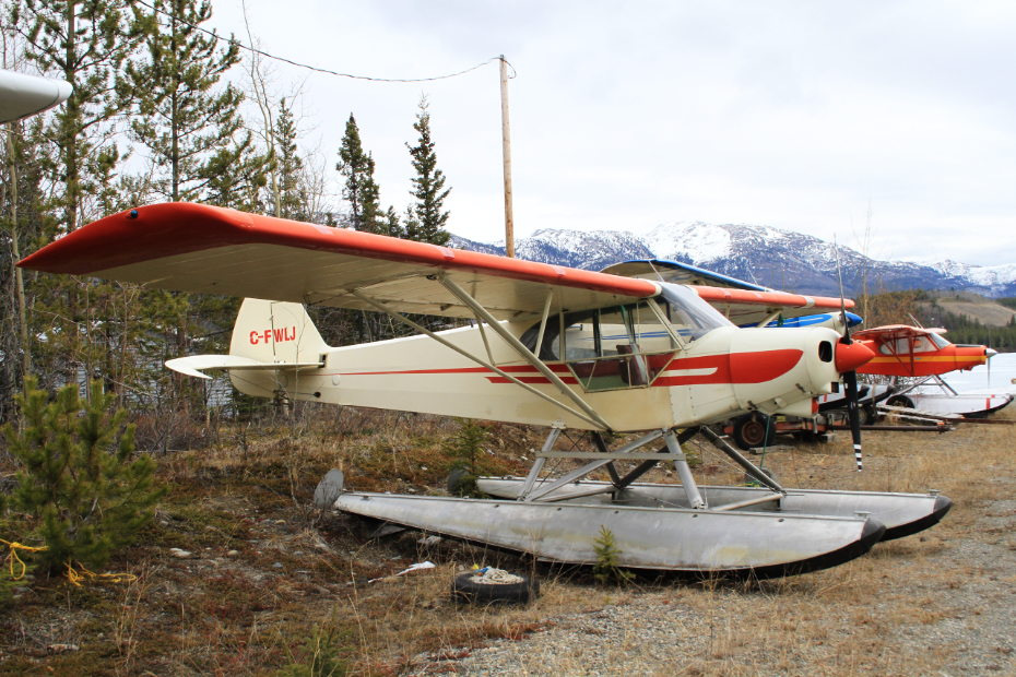C-FWLJ, a 1966 Piper PA-18-150 Super Cub owned by Widrig Outfitters, at Schwatka Lake (CEZ5), Whitehorse, Yukon, on April 26, 2012.