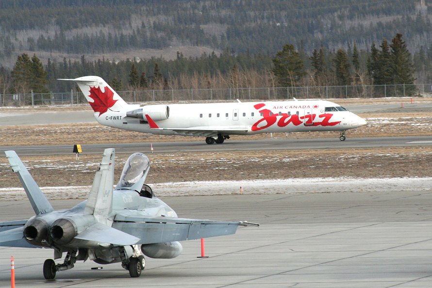 C-FWRT, a Canadair CL-600-2B19 operated by Air Canada Jazz taking off at Whitehorse