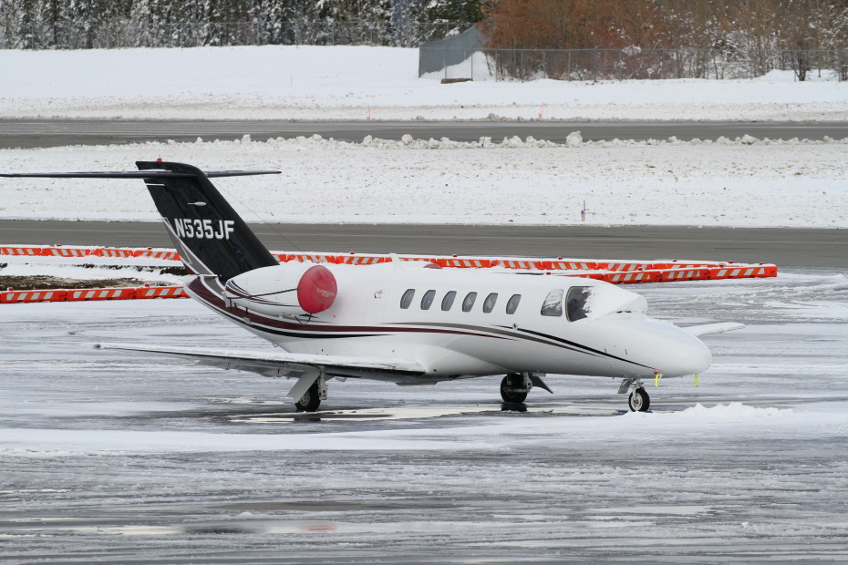 Ariel Leasing's Cessna 525A CitationJet CJ2 N535JF on the snowy ramp at Whitehorse, Yukon (YXY) on October 7, 2019.