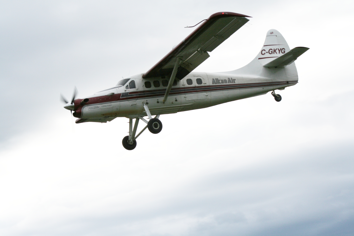 C-GKYG, a 1958 de Havilland DHC-3 Turbo Otter operated by Alkan Air, landing at Whitehorse, Yukon (YXY), on June 29, 2006.