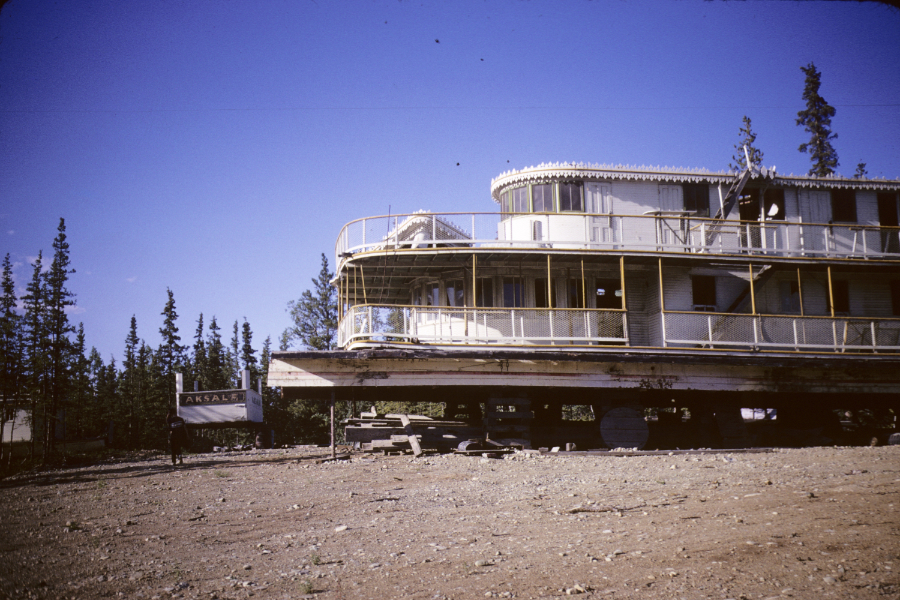 The superstructure of the sternwheeler Aksala at Mile 900 of the Alaska Highway in 1966 - it was planned to be the centre block of a motel.