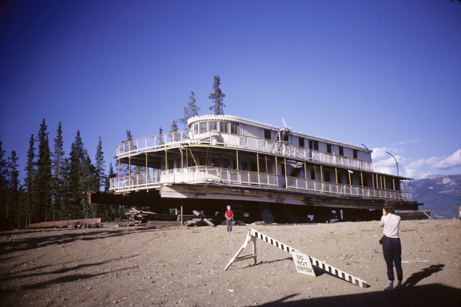 The superstructure of the sternwheeler Aksala at Mile 900 of the Alaska Highway. Photo shot in 1966 - digital image donated to ExploreNorth by Michael Drews in 2025.