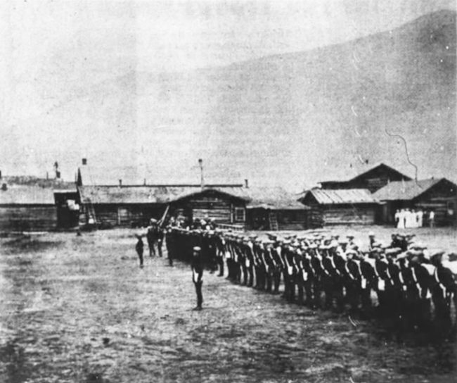 Klondike, last parade N.W.M.P. and Yukon Field Force, Dawson, Yukon Territory, midnight, June 26, 1900.