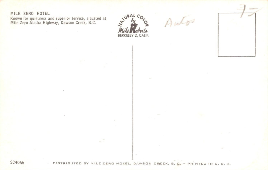 Postcard showing the Mile Zero Hotel with several vehicles in front, in about 1960.
