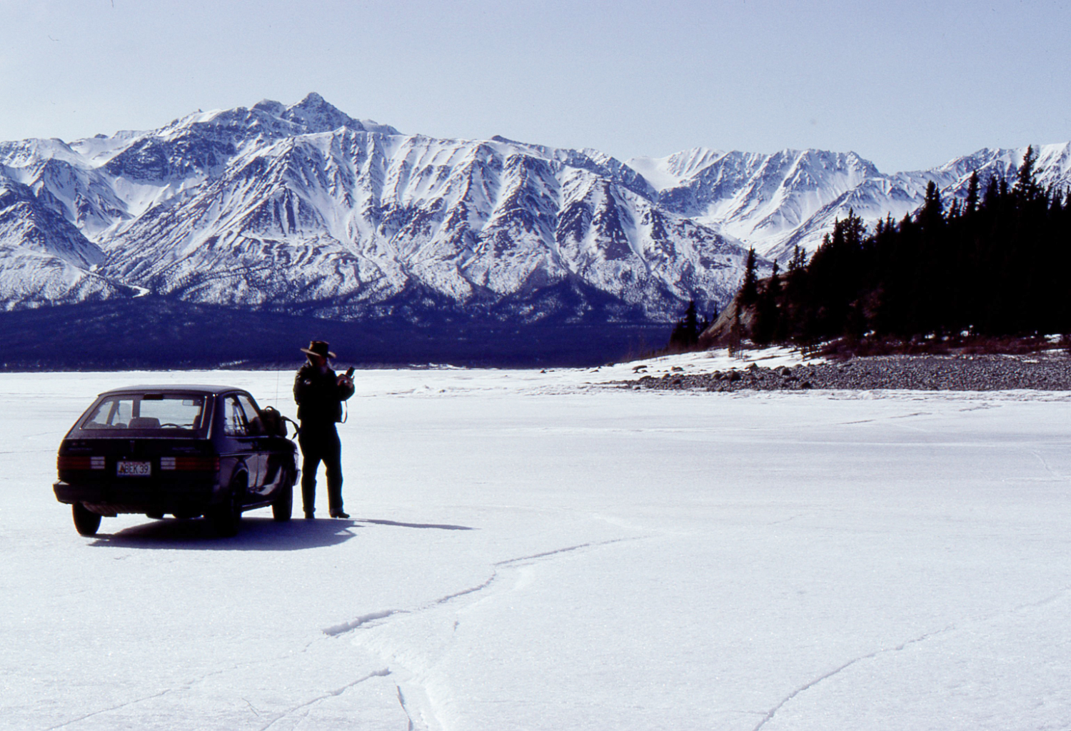 Driving on the ice of Kluane Lake, 6 miles from the nearest road, the Alaska Highway.
