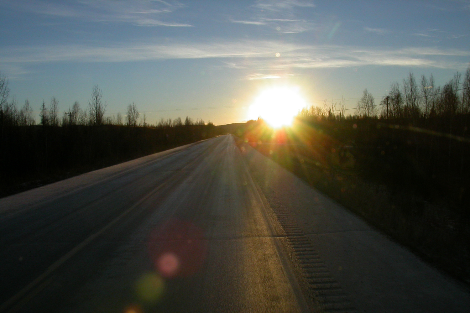 Noon sun over the Alaska Highway on December 20