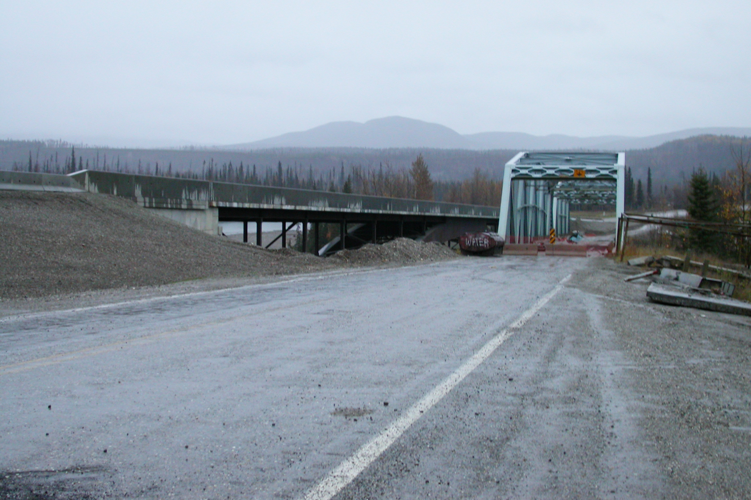 The new and old bridges at Coal River, Alaska Highway.