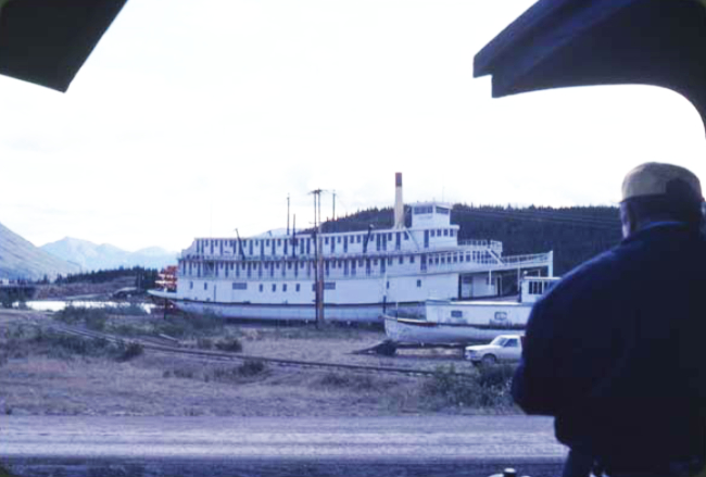 Tutshi photographed from a WP&YR train in Carcross ca. 1981. Yukon Archives: Shirley Van Campen fonds, PHO 525 2001/162R #49.