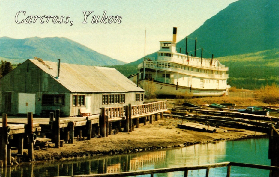 Postcard: the sternwheeler Tutshi on the bank of the Nares River in downtown Carcross.